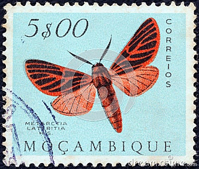 MOZAMBIQUE - CIRCA 1953: A stamp printed in Mozambique shows a Metarctia lateritia moth, circa 1953. Editorial Stock Photo