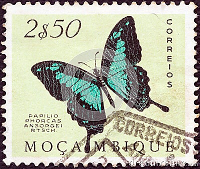 MOZAMBIQUE - CIRCA 1953: A stamp printed in Mozambique shows a Green swallowtail Papilio phorcas ansorgei butterfly, circa 1953. Editorial Stock Photo