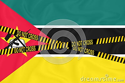 Mozambique flag, the Don`t Cross the Line mark and the location tape. Crime concept, police investigation, quarantine. 3d Stock Photo