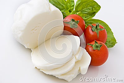 Mozzarella, cherry tomatoes and basil Stock Photo