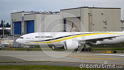 MSC Air Cargo 777F freighter infront of Boeing manufacturing factory Editorial Stock Photo