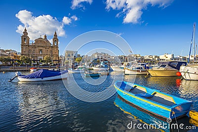 Msida, Malta - Traditional blue painted maltese fishing boat Stock Photo