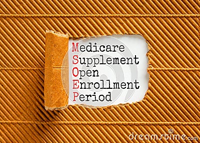 MSOEP symbol. Concept words MSOEP medicare supplement open enrollment period on white paper. Beautiful brown background. Medical Stock Photo