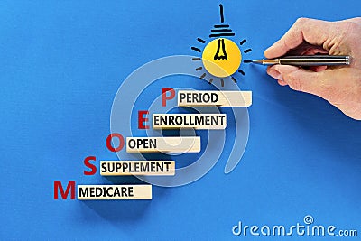 MSOEP symbol. Concept words MSOEP medicare supplement open enrollment period on wooden block. Beautiful blue background. Medical Stock Photo