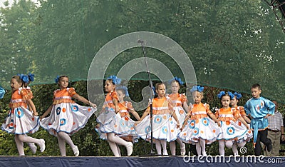 Mstera,Russia-August 8,2015: Children dance on scene at day of the city Mstera,Russia Editorial Stock Photo