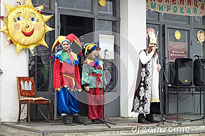 Mstera,Russia-March 13,2016: Appearance actor in colorful gown a Editorial Stock Photo