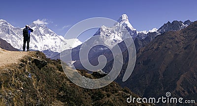 Mt. Ama Dablam and trekker Stock Photo