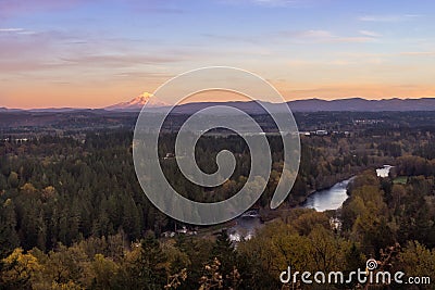 Mt.Hood and Clackamas river in autumn sunset Stock Photo