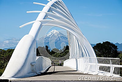 Mt Taranaki framed by the architectural steel structured bridge Editorial Stock Photo