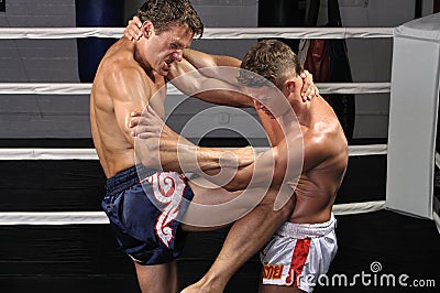 Muay Thai match in ring Stock Photo