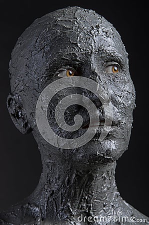 Woman with clay face mask Stock Photo