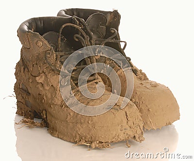 Muddy boots Stock Photo