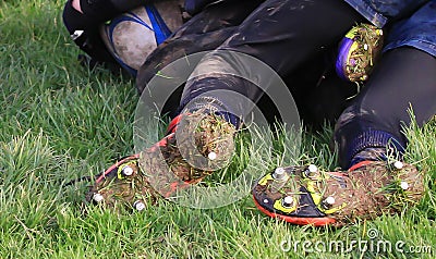 Muddy boots Stock Photo