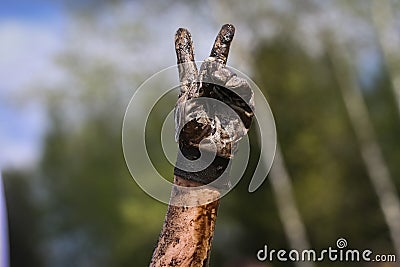 Muddy obstacle race runner in action. Mud run Stock Photo