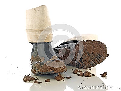 Muddy rubber boots Stock Photo