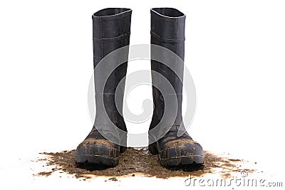 Muddy rubber boots front view Stock Photo
