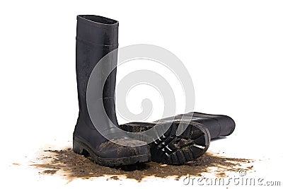 Muddy rubber fallen boots 3/4 view isolated on white Stock Photo