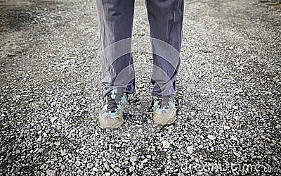 Muddy shoes Stock Photo