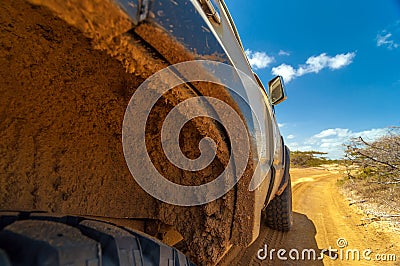 Muddy Wheel Well on SUV Stock Photo