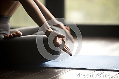 Mudra gesture close up, sporty woman practicing yoga Stock Photo