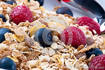 Muesli with Raspberries and Blueberries Stock Photo