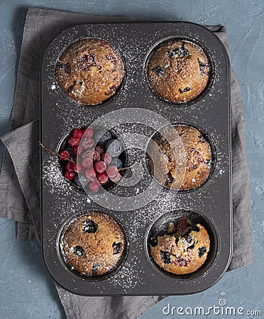 Muffins blueberry redberry homemade cake baked top view Stock Photo