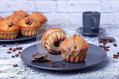 Muffins with chocolate and raisins. Homemade baking.p of coffee. Close-up Stock Photo