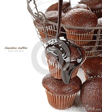 Muffins with chocolate sauce Stock Photo