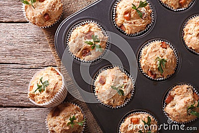 Muffins with ham and cheese close up in baking dish. horizontal Stock Photo