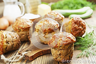 Muffins with zucchini, cheese and herbs Stock Photo