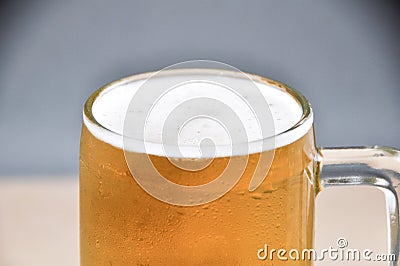 Mug of beer on white background Stock Photo