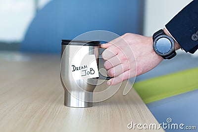 Mug that says Dream Job. Stock Photo