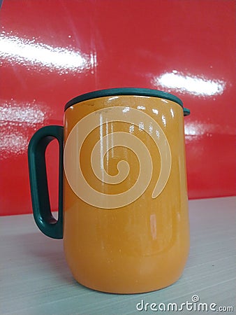 Mug stainlees Orange Stock Photo