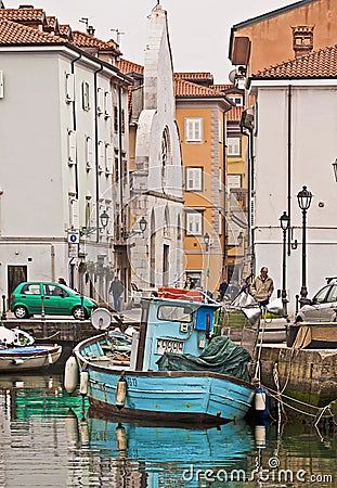 Muggia, Italy - View of the wharf in the port called Mandracchio Editorial Stock Photo