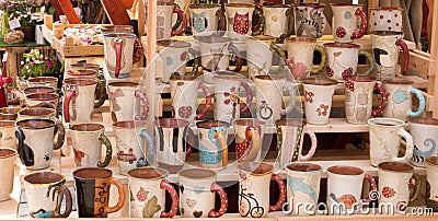 Mugs of various shapes and pictures. Spancirfest 2019 Editorial Stock Photo