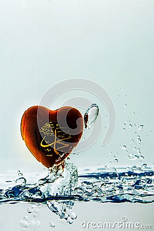 `muhammad ` prophet of Islam symbol Water splash with bubbles of air, on the white background Stock Photo