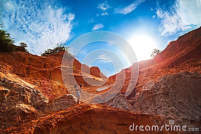 Muine, Vietnam - July 18, 2019 - Fairy Stream. Red canyon on the background of blue sky. People walking and taking pictures Editorial Stock Photo