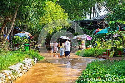 Muine, Vietnam - July 18, 2019 - Fairy Stream. River, Red Canyon. People walk on the river Editorial Stock Photo