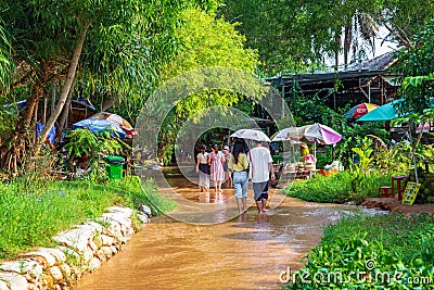 Muine, Vietnam - July 18, 2019 - Fairy Stream. River, Red Canyon. People walk on the river Editorial Stock Photo