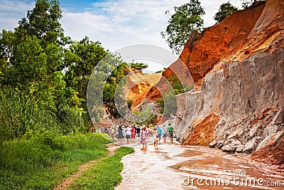 Muine, Vietnam - July 18, 2019 - Fairy Stream. River, red canyon. People walking and taking pictures Editorial Stock Photo