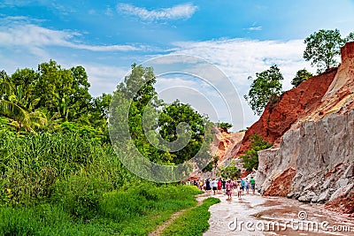 Muine, Vietnam - July 18, 2019 - Fairy Stream. River, red canyon. People walking and taking pictures Editorial Stock Photo