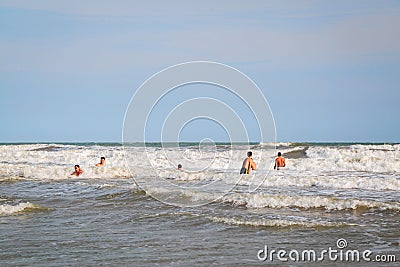 Muine, Vietnam - July 18, 2019 - South China sea. People swim in the sea Editorial Stock Photo