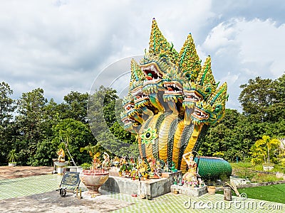 Mukdahan, Thailand - July 31, 2022: seven-headed Naga named Sri Rattanakarat at Wat Dan Phra In temple, Nikhom Kham Soi, Mukdahan Editorial Stock Photo