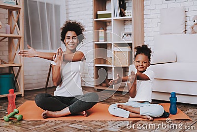 Girl with Mother Training in Studio Together. Stock Photo