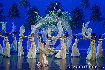 Mulberry mother feeding silkworm-The first act: the mulberry garden-Epic dance drama `Silk Princess` Editorial Stock Photo