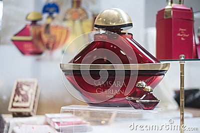 Big bottle perfume of Samsara by Guerlain at the flea market Editorial Stock Photo