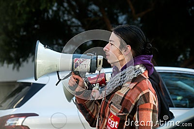 people protesting in the street agaisnt the pensioners reform with megaphone Editorial Stock Photo