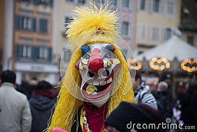 Portrait of masked people parading in the street Editorial Stock Photo