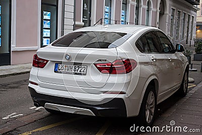 rear view of BMW X4 parked in the street Editorial Stock Photo