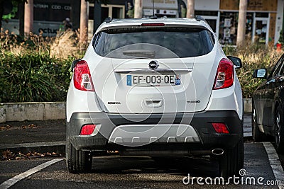 Rear view of white Opel SUV parked in the street, Opel is a famous german brand of cars Editorial Stock Photo